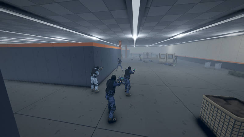 A team in blue camo pushes down a hall along a wall, guns up. Fallen players lie further ahead between the boards.